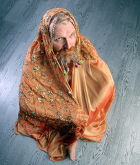 portrait of a man with beige scarf