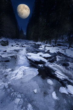 wild mountain river in the winter time