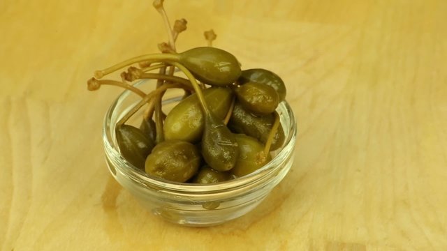 Marinated capers on a branch