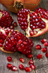 fresh pomegranate on wooden background