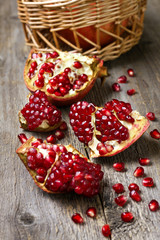 fresh pomegranate on wooden background