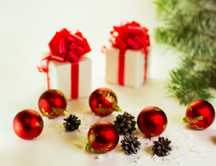 gifts on a white background with Christmas balls
