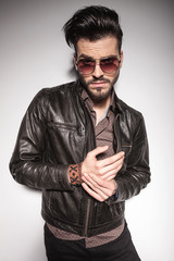 young fashion man making a funny face