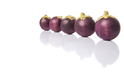 Round shape eggplant over white background