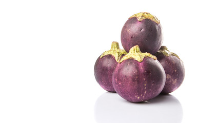 Round shape eggplant over white background