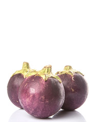 Round shape eggplant over white background