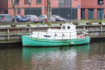 motor boat stand at a berth