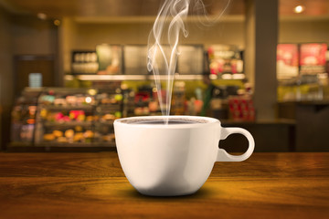 Coffe Splash On Wood Table In Coffee Shop