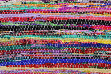 Recycling, handmade colorful ethnic motley retro rug, carpet