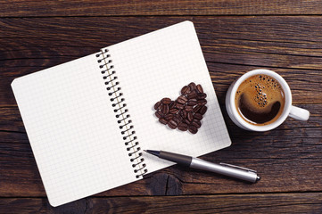 Coffee, heart and notepad