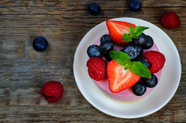 souffle cake with fresh raspberries, blueberries and strawberrie