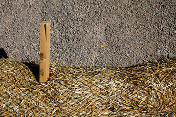 Hay in Netting - Fiber Roll in Work