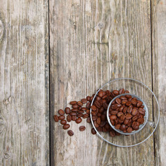 Ñup of coffee on a wooden background