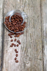 Ñup of coffee on a wooden background