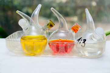 Chemical flasks filled with the chemical liquid