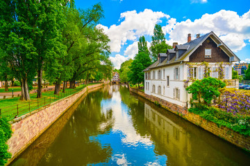 Fototapeta na wymiar Strasbourg, water canal in Petite France area, Unesco site. Alsa