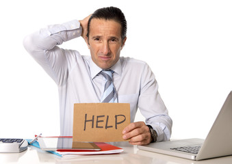 overworked senior businessman working at office in stress