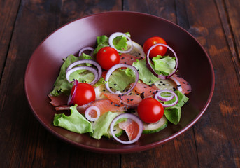 Fresh fish salad with vegetables