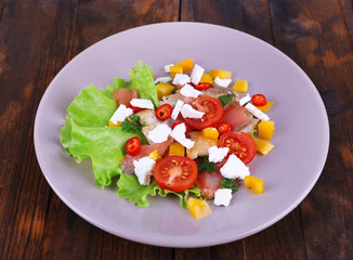 Fresh fish salad with vegetables
