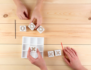 Game of Tic Tac Toe on wooden background