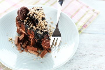Yummy chocolate cake served on table