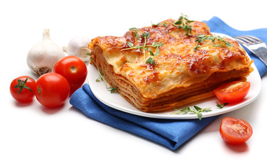 Portion of tasty lasagna, isolated on white