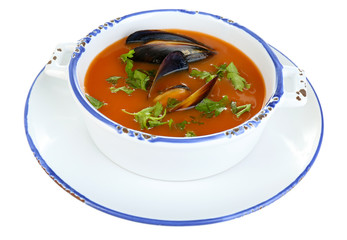 Tasty mussel soup isolated on white