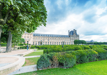 Fototapeta premium PARIS - JUNE 15, 2014: Tourists in Tuileries Gardens on a summer