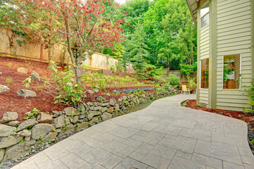 Backyard leveled landscape design