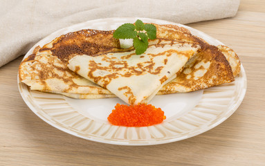 Pancakes with red caviar