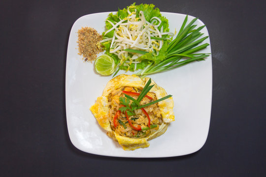 Plate of Pad Thai or phat Thai in omelette