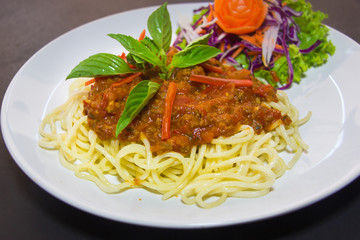 pasta with meatballs and parsley with tomato sauce