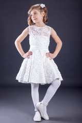 Naklejka premium Portrait of little girl in luxurious dress. Fashion photo