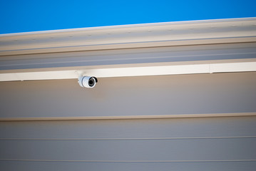 Security camera protecting a house