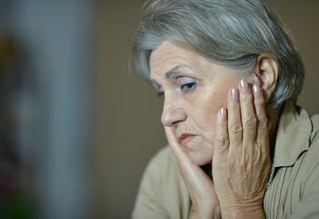 Fototapeta premium Sad aged woman