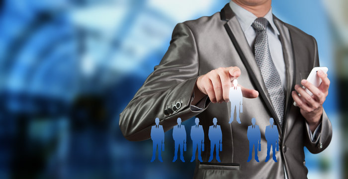Businessman pressing on digital virtual screen, human resource m