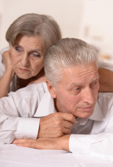 Portrait of a sad elderly couple