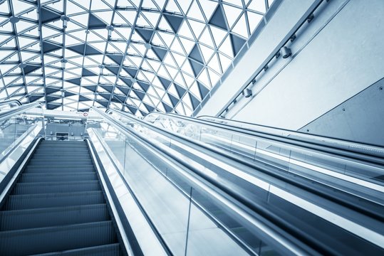 Moving escalator in the business center