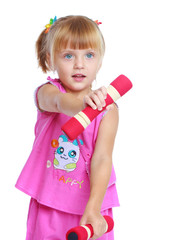 Little girl in a pink suit.