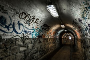 Dark undergorund passage with light