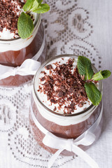 chocolate mousse with whipped cream vertical top view
