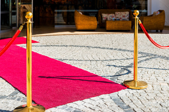 paving stones and red carpet for VIP guests