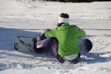 Fototapeta na wymiar Snowboarder im Schnee