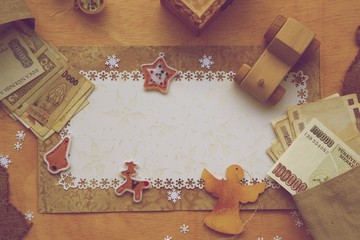 Winter holidays background on a wooden surface. Free space for a text. Vintage