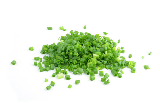 chopped fresh green onions isolated on white