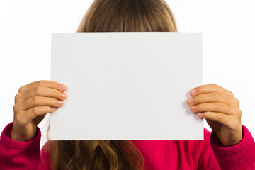 Child with blank white sign