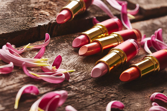 Lipsticks with flower petals