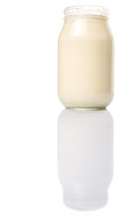 Mayonnaise in a jar over white background