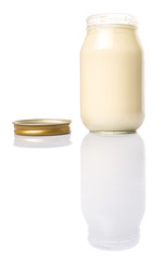 Mayonnaise in a jar over white background