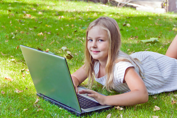 Cute girl with laptop